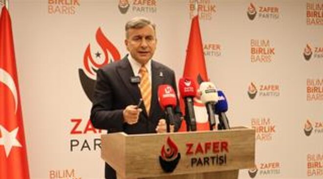 AZMİ KARAMAHMUTOĞLU